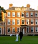 Couple infront of house