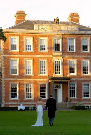 Couple infront of house