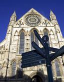 Ground view of York Minster showing directions through York 1543368199
