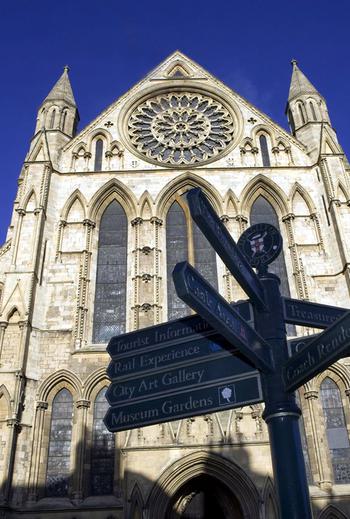 Ground view of York Minster showing directions through York 1543368199