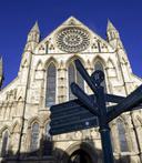 Ground view of York Minster showing directions through York 1543368199
