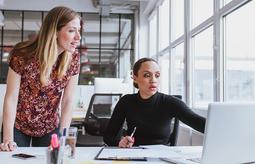 Two Ladies working 497331935